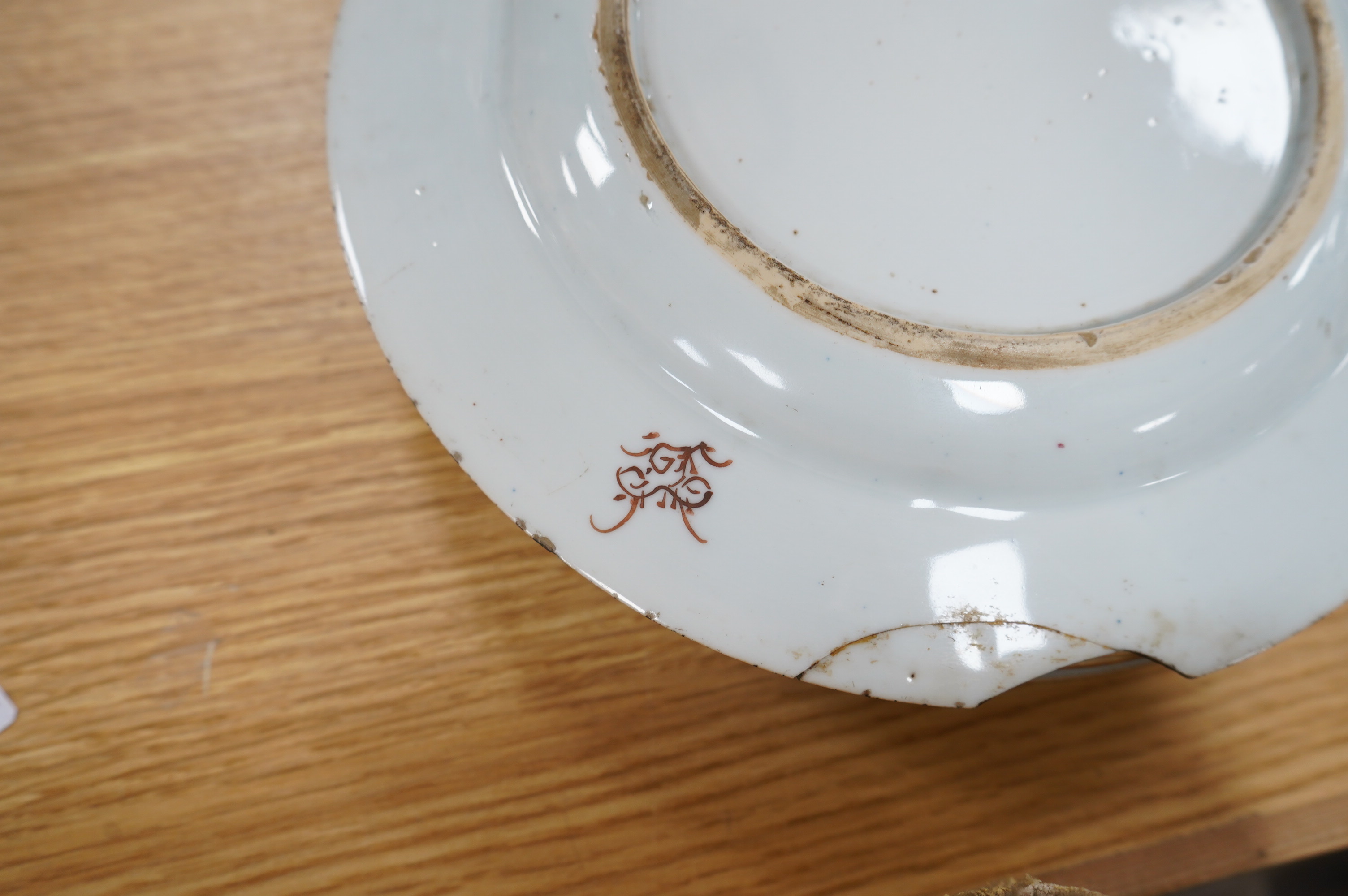 A set of five Chinese porcelain famille rose dishes, diameter 22.5cm, and three others (8). Condition - poor, significant damage to many.